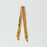 Hermes Candy Doll Mini Twilly In Yellow, Caramel And Black - Found Fashion