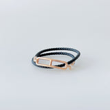 Hermes Roulis Double Tour Bracelet In Black With A Rose Gold Closure - Found Fashion