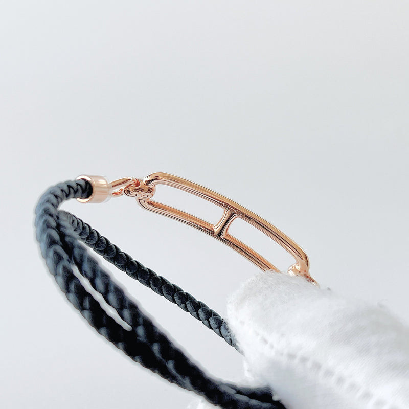 Hermes Roulis Double Tour Bracelet In Black With A Rose Gold Closure - Found Fashion