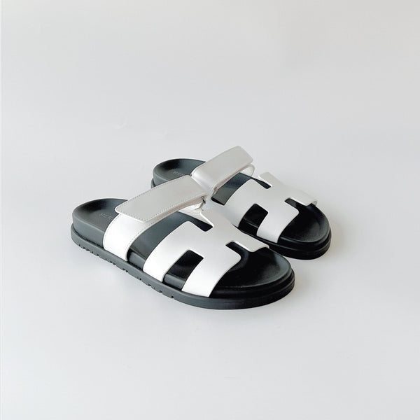 Hermes Women's Chypre Sandal In White & Black Leather, Size 39 - Found Fashion