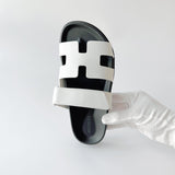 Hermes Women's Chypre Sandal In White & Black Leather, Size 39 - Found Fashion