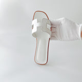 Hermes Women's Oran Sandal In White, Size 37.5 - Found Fashion