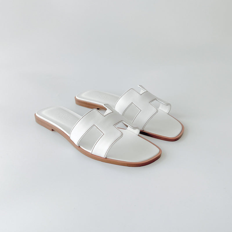 Hermes Women's Oran Sandal In White, Size 37.5 - Found Fashion