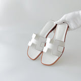 Hermes Women's Oran Sandal In White, Size 37.5 - Found Fashion
