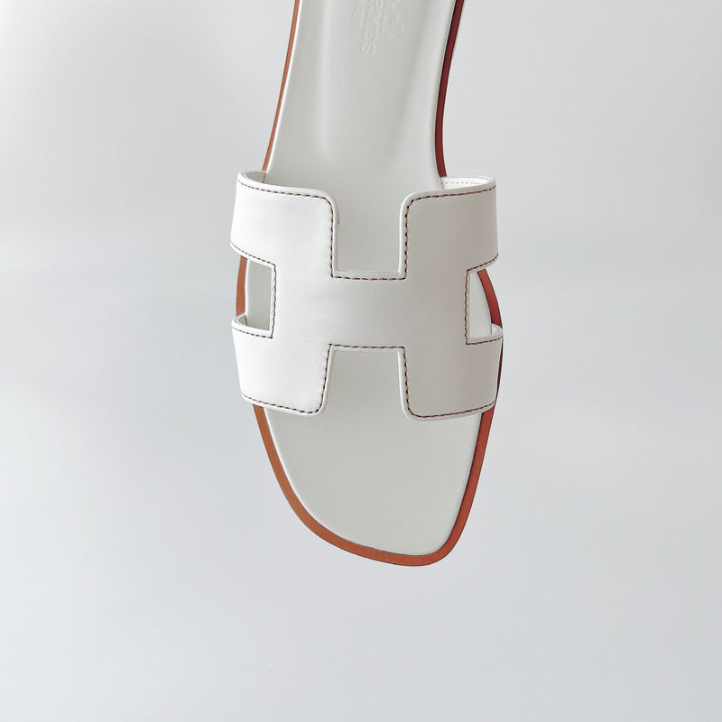 Hermes Women's Oran Sandal In White, Size 37.5 - Found Fashion
