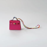 Hermes Mini Kelly Twilly Bag Charm In Lipstick Pink And Gold Hardware