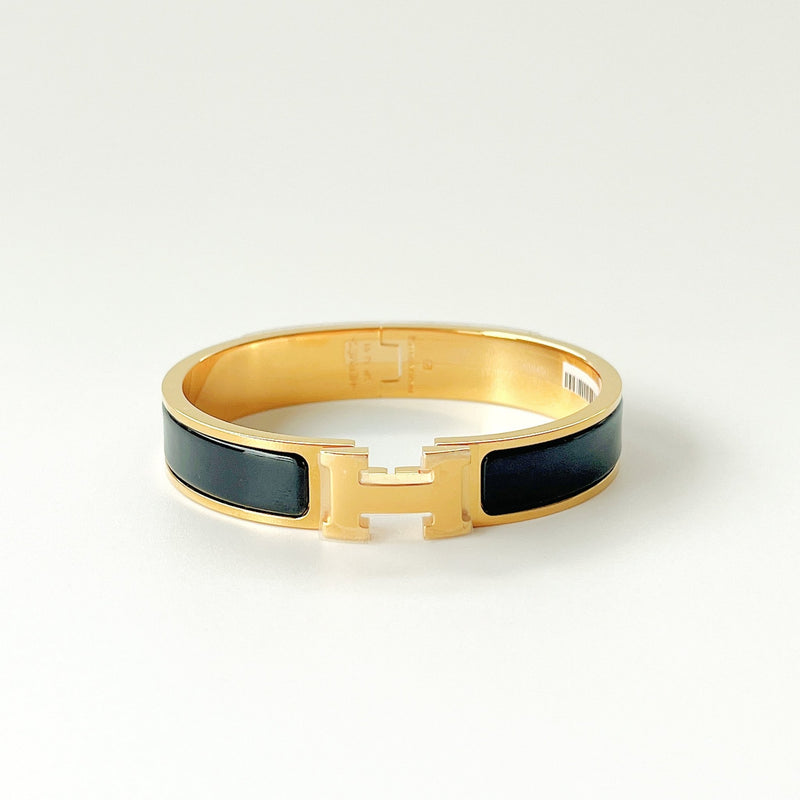Hermes Clic H Bracelet In Black And Gold - Found Fashion