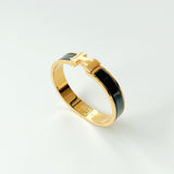 Hermes Clic H Bracelet In Black And Gold - Found Fashion