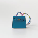 Hermes Mini Kelly Twilly Bag Charm In Bleu Izmir (Blue) And Gold Hardware - Found Fashion