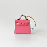 Hermes Mini Kelly Twilly Bag Charm In Lipstick Pink And Gold Hardware - Found Fashion