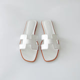 Hermes Women's Oran Sandal In White, Size 37.5 - Found Fashion